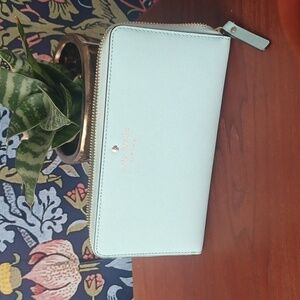 Kate Spade New York Leather Cedar Street Zip Around Lacey Wallet in Grace Blue